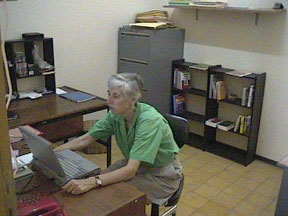 Clare Ann in the home office shortly after we arrived - jpg - 18460 Bytes