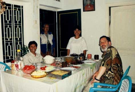 Dinner at Ibu Tari and Pak Kris' house. Tari's mother is in the doorway. - jpg - 24338 Bytes